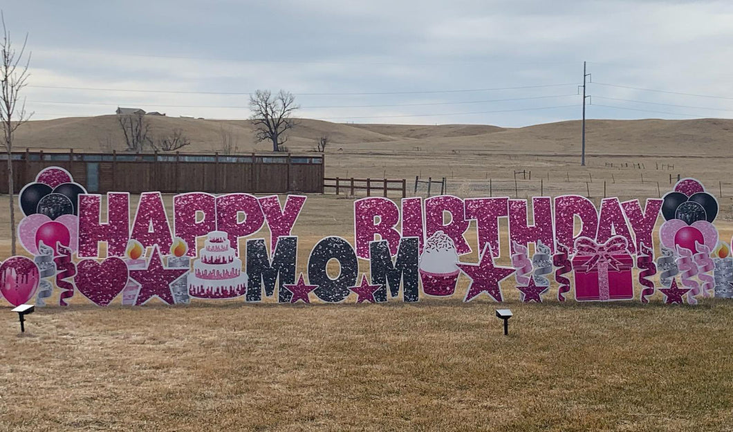 Happy Birthday mom yard sign with balloons and streamers. Installed in Rapid City SD. Lawn sign rental and installation included.